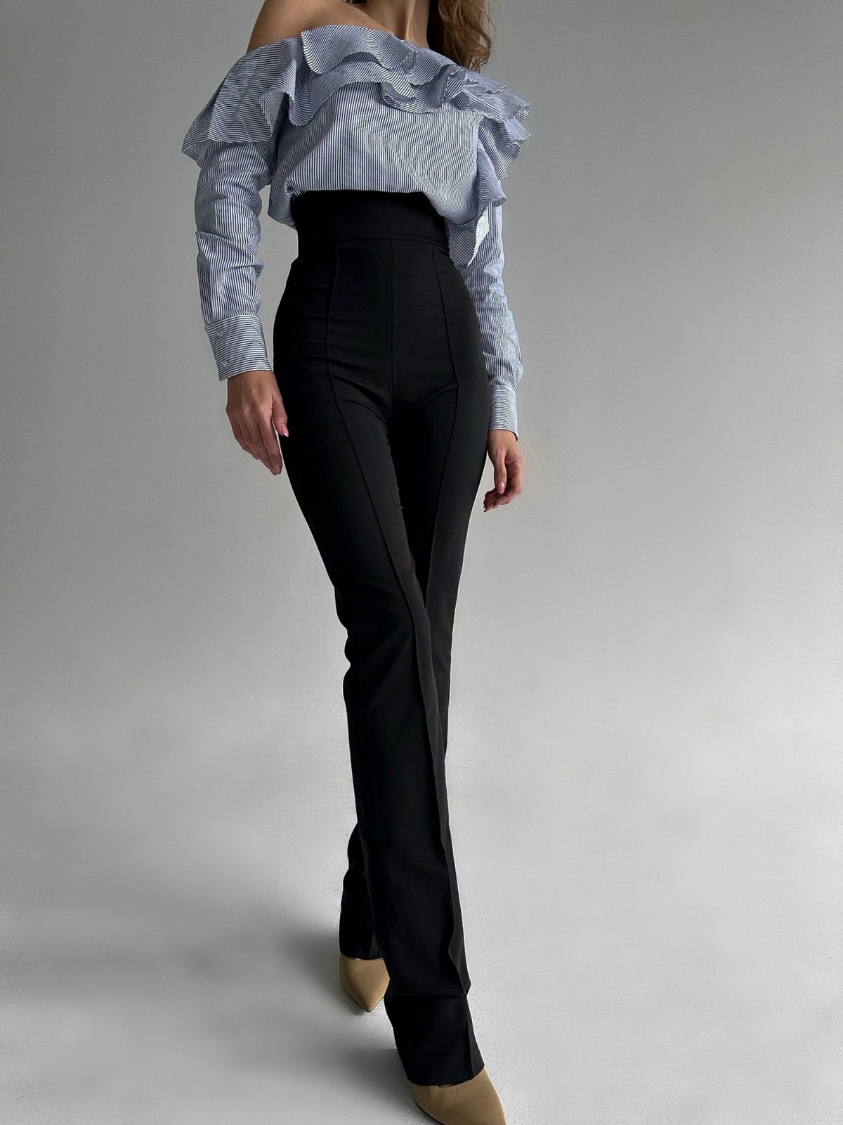 Side view of one-shoulder long sleeve top in blue and white stripe — sizes XXS to M