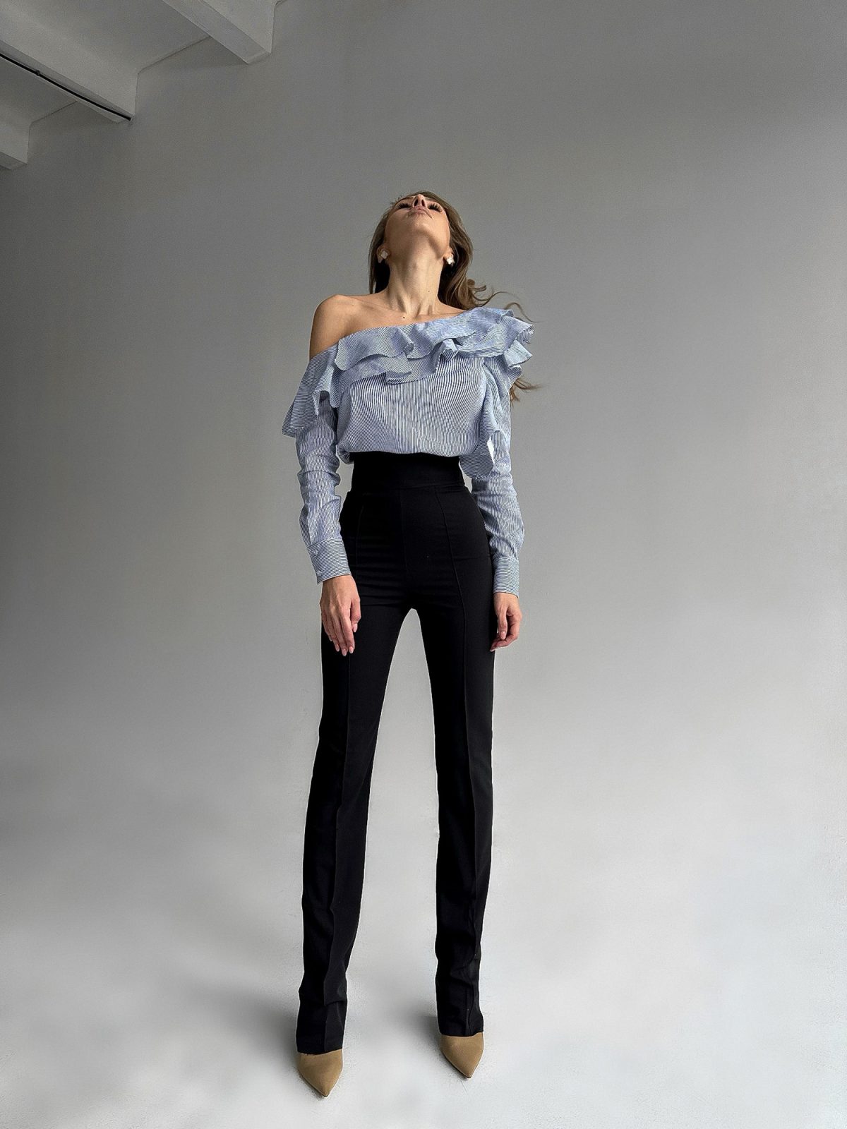 double ruffle neckline on one-shoulder blouse in blue and white striped cotton